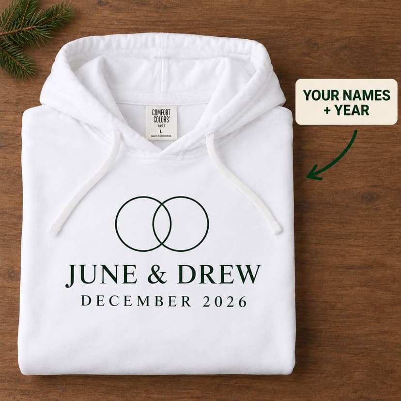 Personalized First Christmas Hoodie, Linked Rings Christmas Emblem, Newlywed Couple Names and Year Gift
